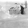 Kennedy excavating magnetic igloo after its collapse in a blizzard